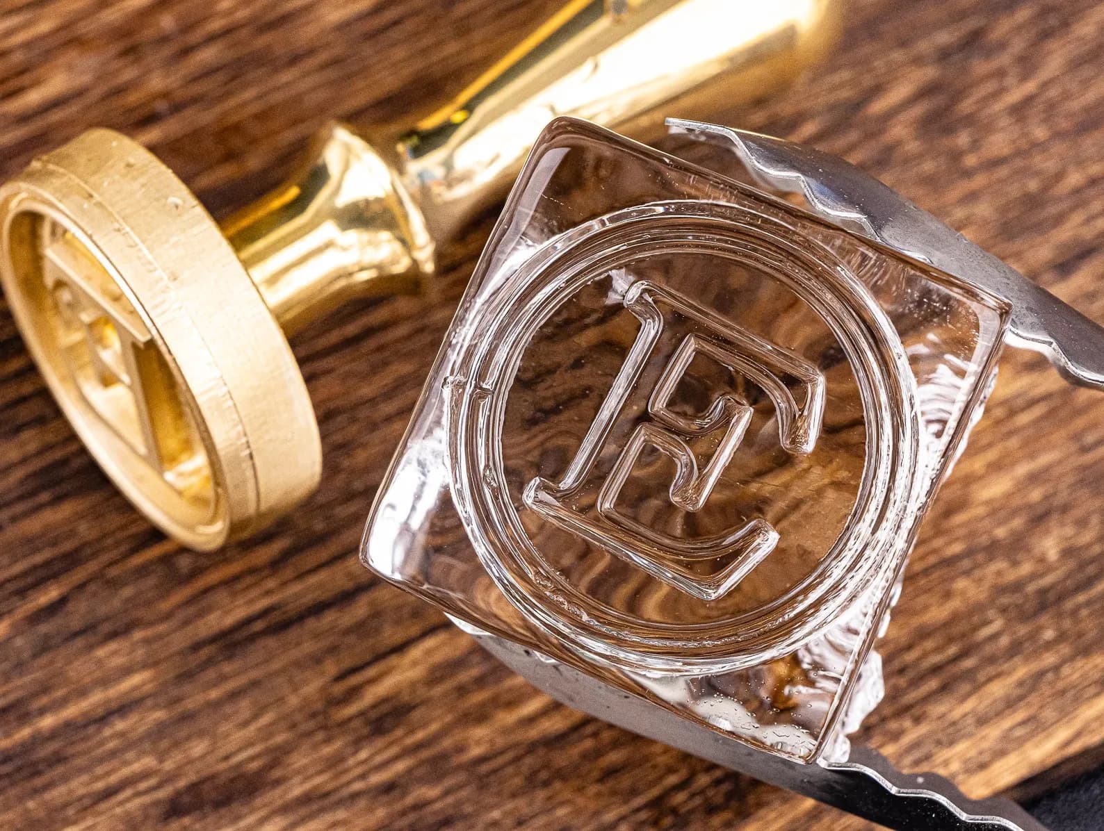 Personalised ice stamp logo in whiskey glass